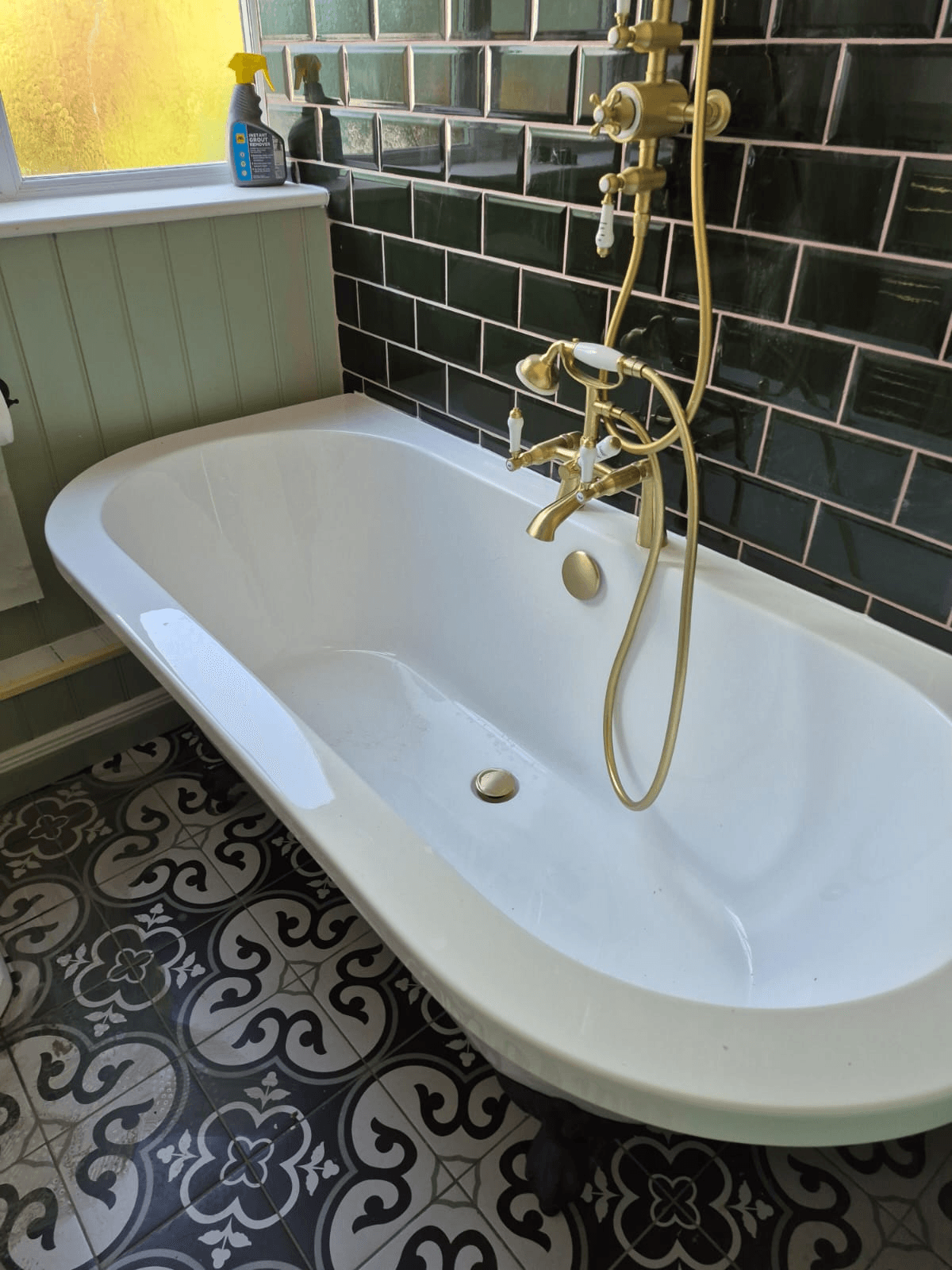 Luxury freestanding bath with brass taps installed by Lincolnshire Bathroom Installations