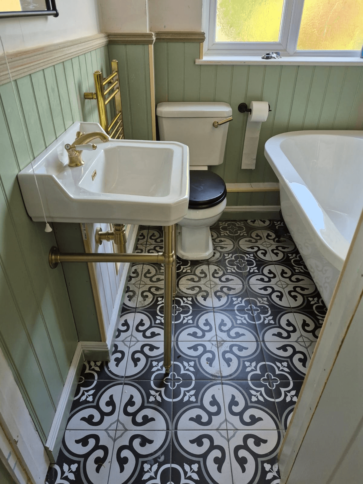 Victorian bathroom with sage panelling installed by Lincolnshire Bathroom Installations